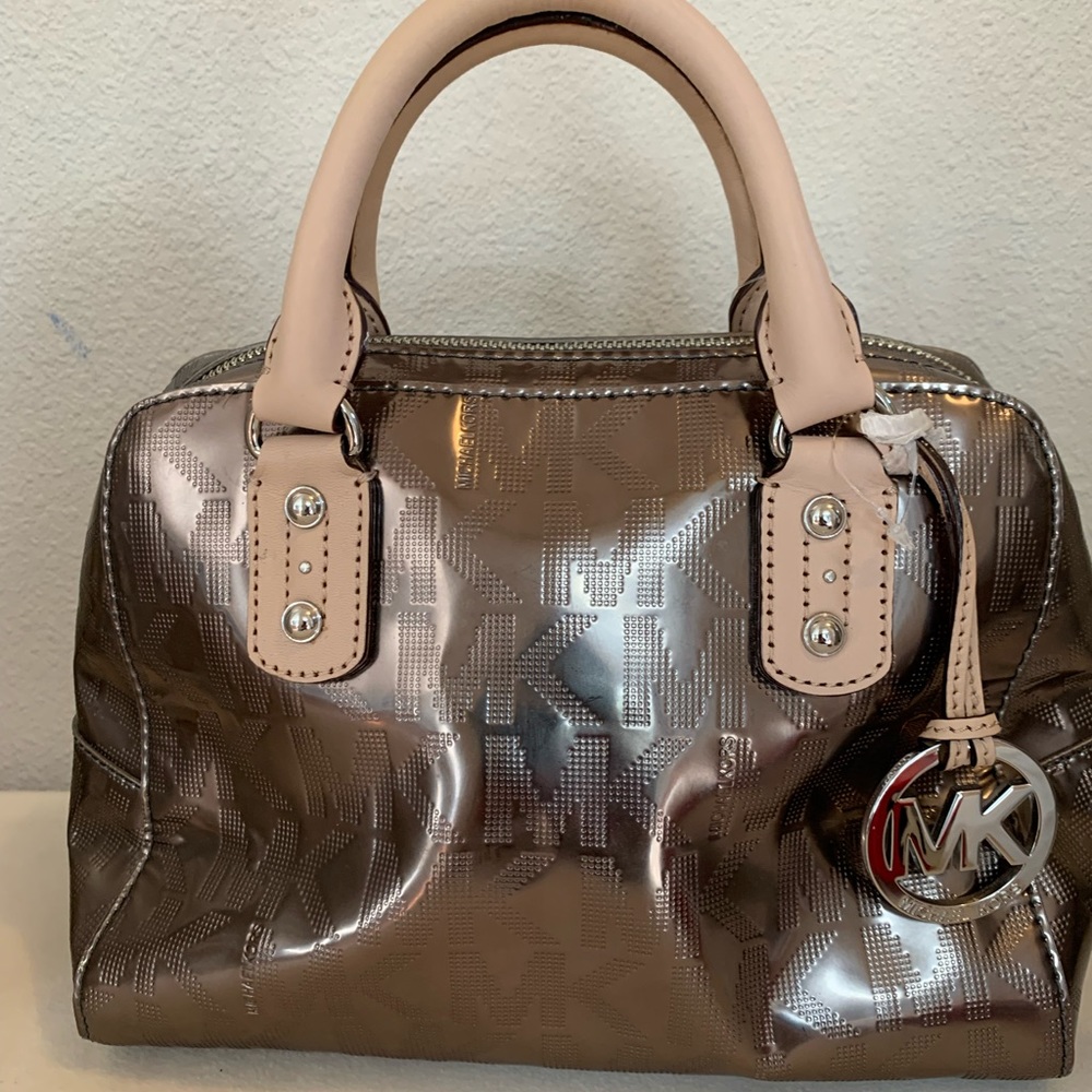 Brand new Michael Kors purse with detachable long strap.